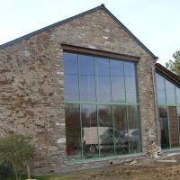 Rénovation d'une maison et création d'une grande baie vitrée